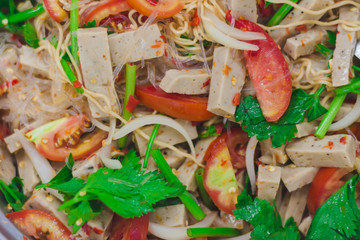 Instant noodle salad with seafood and vegetable. It is spicy and very hot but yummy. This is clever menu. Easy cook and fast. Instant noodle can do for easy dinner and good meal.