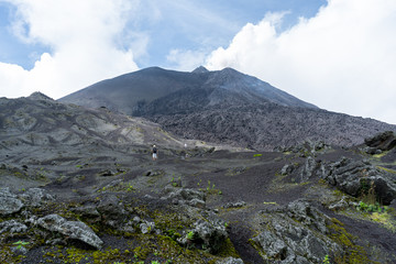 People are climbing the Pacaya volcano and some are taking selfies.