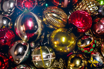 Selective Focus Closeup of Colorful Vintage Christmas ornaments of various size and shape