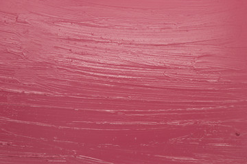 This is a photograph of a Pink Lipstick swatch background