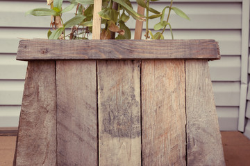 Top edge of patio planter made from reclaimed shipping palettes