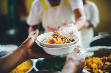 Helping people with food donations, alleviating hunger and hunger : concept of poverty