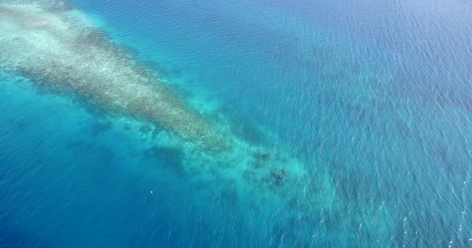 South sea aerial view of coral reef and calm turquoise sea water in Fiji islands
