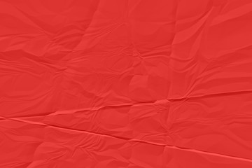 crumpled red paper background close up