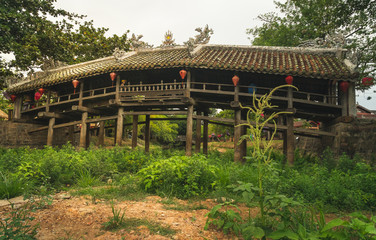 Fototapeta na wymiar Japanese Bridge, Thanh Toan bridge. Wooden bridge in Oriental style in Hue, Vietnam