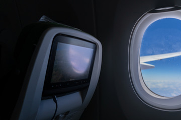 Seat and window in an international airplane 