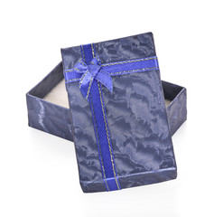 Blue open gift box with white bow isolated on white