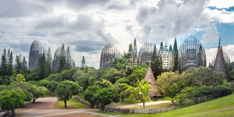 Tjibaou Cultural Centre, the Kanak native museum, made mainly of ten ribbed structures made of steel and Iroko wood, inspired by the traditional Kanak huts, in Noumea, New Caledonia.. - obrazy, fototapety, plakaty