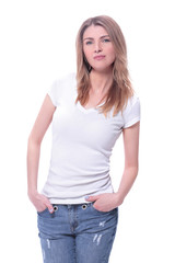 Obraz premium happy smiling beautiful young woman in white top and jeans