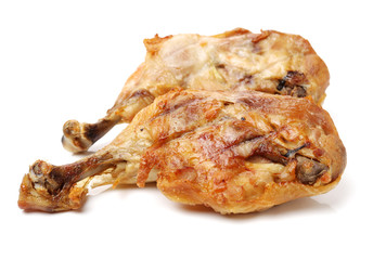 Grilled chicken leg on white background