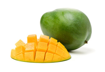 Mango slice cut to cubes close-up isolated on white background