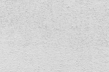 Rough white relief stucco wall texture background. blank for designers
