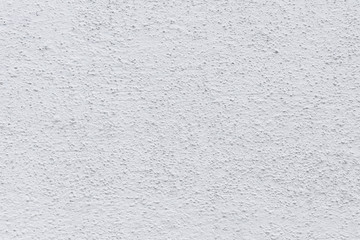 Rough white relief stucco wall texture background. blank for designers
