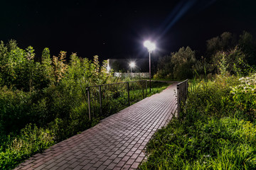 The town path with bridge in night