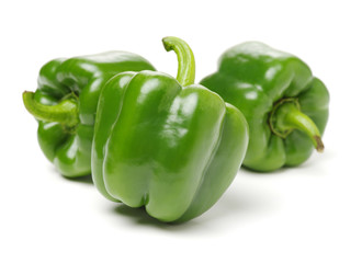 fresh green bell pepper (capsicum) on a white background