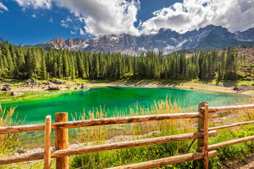 Fototapeta na wymiar Beautiful Carezza lake in summer, Dolomites, Italy