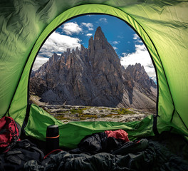 Camping in tent at Tre Cime in Dolomites, Italy © shaiith
