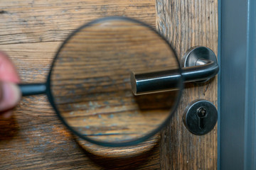 Private detective. Viewed with a magnifying glass.
