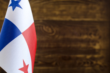 Fragment of the flag of Panama in the foreground space for text blurred background