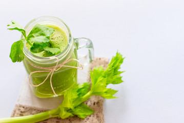 fresh celery juice in a jar. concept of healthy food and detox. Selective focus.