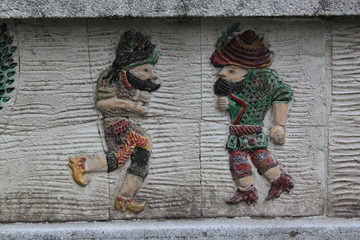 old ottoman puppets on the wall as relief. Bursa, Turkey