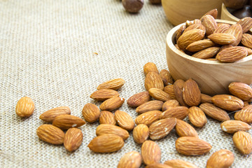 Almonds on wooden vintage background