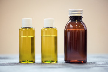 Aromatherapy oil in a bottles on the table.