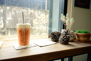 thai milk tea on the table in cafe