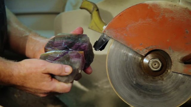 Two shots of stone cutting
