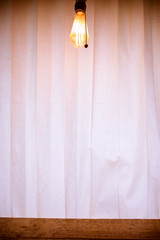 white curtain and vintage lamp background