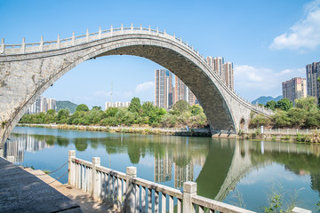 Vintage Arch Bridge Qingfeng Bridge, Ailian Lake Park, Cangzhou City, Hunan Province, China