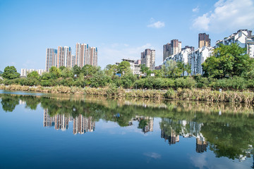 Fototapeta na wymiar High-rise buildings on the banks of the Lancang River in Zhangzhou City, Hunan Province, China