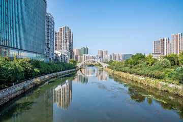 Fototapeta premium High-rise buildings on the banks of the Lancang River in Zhangzhou City, Hunan Province, China