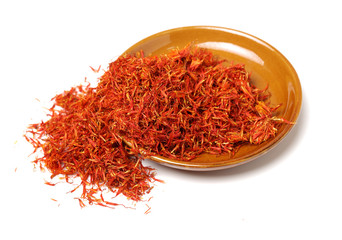 Fototapeta premium Dried safflower on white background