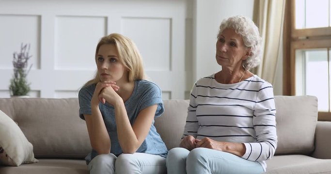 Stubborn young daughter ignore worried senior mother arguing nagging