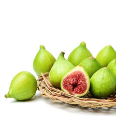 Ripe figs on a white background