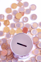 PIGGY BANK WITH SURROUNDED COINS ON CLEAR FUND