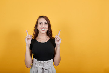 Girl happy and delighted as she has done something big. She is also dancing.