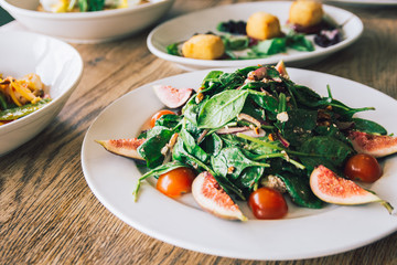 Italian style salad. Feta fig salad close up