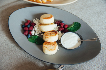 delicious breakfast for two on bed at the luxury hotel