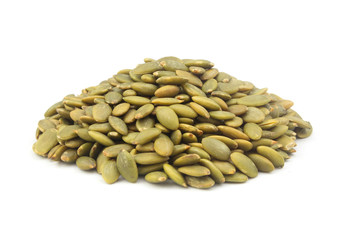 Heap of pumpkin seeds isolated on white background