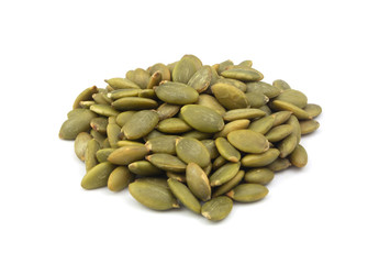 Green pumpkin seeds isolated on white background