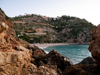  maritime scene with stones and clouds at sunrise