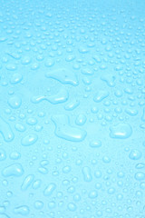 Close up water drops on blue background, Water drop in macro photography