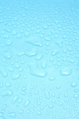 Close up water drops on blue background, Water drop in macro photography