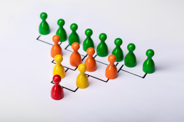 Wooden Pawns Forming Hierarchical Structure