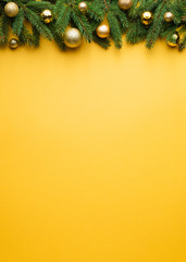 Christmas decoration border on yellow background