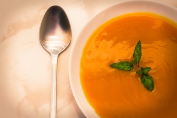 Pumpkin soup close up view, diet concept
