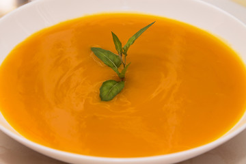 Pumpkin soup close up view, diet concept