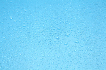 Close up water drops on blue background, Water drop in macro photography